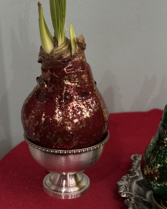 Amaryllis in wax with a copper tint
