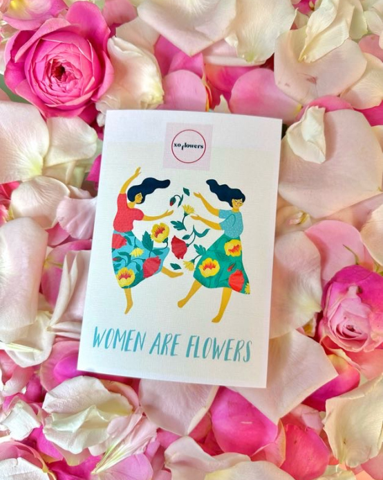 A greeting card «Women are flowers»