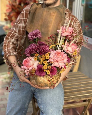 Flower arrangement in a pumpkin