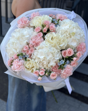 Bouquet with hydrangeas and spray roses.