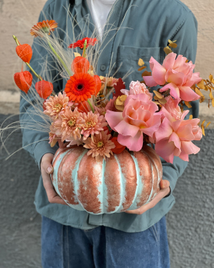 Flower arrangement in a pumpkin