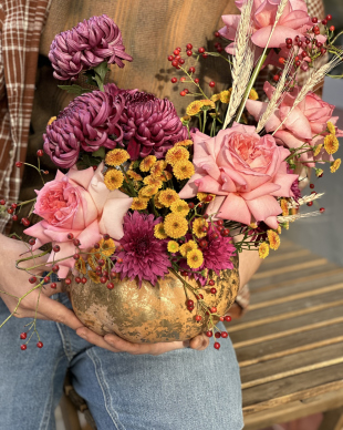 Flower arrangement in a pumpkin