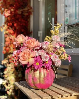 Flower arrangement in a pumpkin