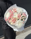 A beautiful bouquet of flowers featuring roses and chrysanthemums