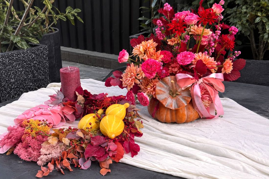 Custom-made fall wreaths and bouquets featuring pumpkins and candles in Chisinau.