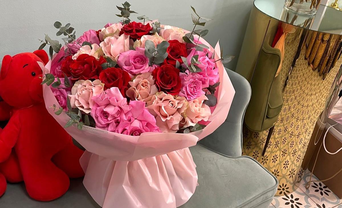 A wonderful bouquet of flowers with a soft toy as a gift for Valentine's Day, XOstudio Flowers.