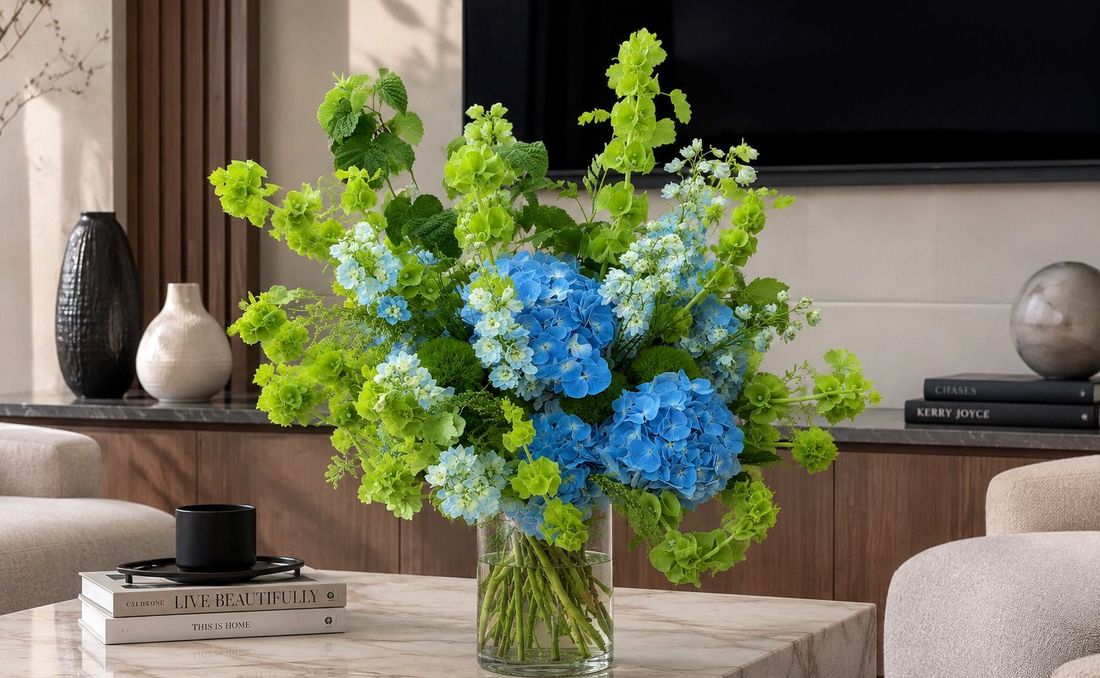 Flowers in a vase in a modern interior, summer floral design.